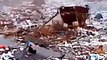 New video: Tsunami ascending the river in Kesennuma - Japan Earthquake 2011