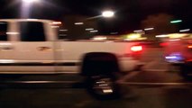REDNECKS GONE WILD - Dodge Cummins Pulls Chevy Over Curb Across Parking Lot -Tug-o-war
