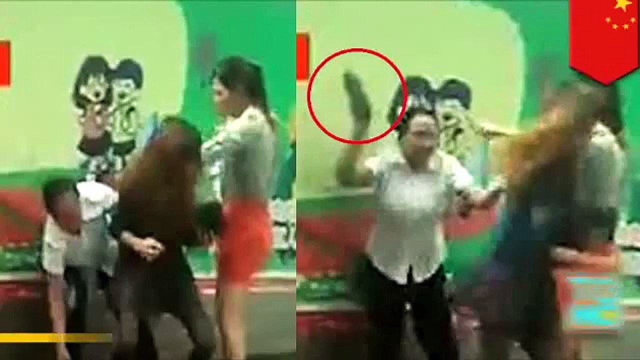 Catfight! Wife attacks husband's mistress with high heels on the street