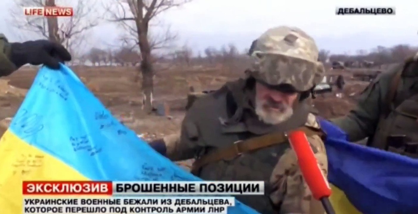 Горы трупов и оружия.Позиции укровояк после "планового" отступления из Дебальцево..Украина,АТО.