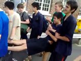 Hamish Chan gets thrown in the pool at Auckland Grammar School