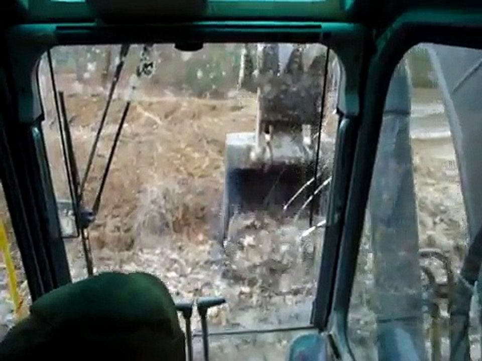 Excavator Working in deep Mud