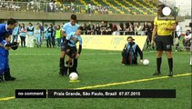 Brazil star Neymar helps disabled kids play football for the first time