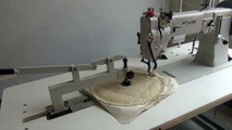 Spiral sewn buffing wheel sewing machine