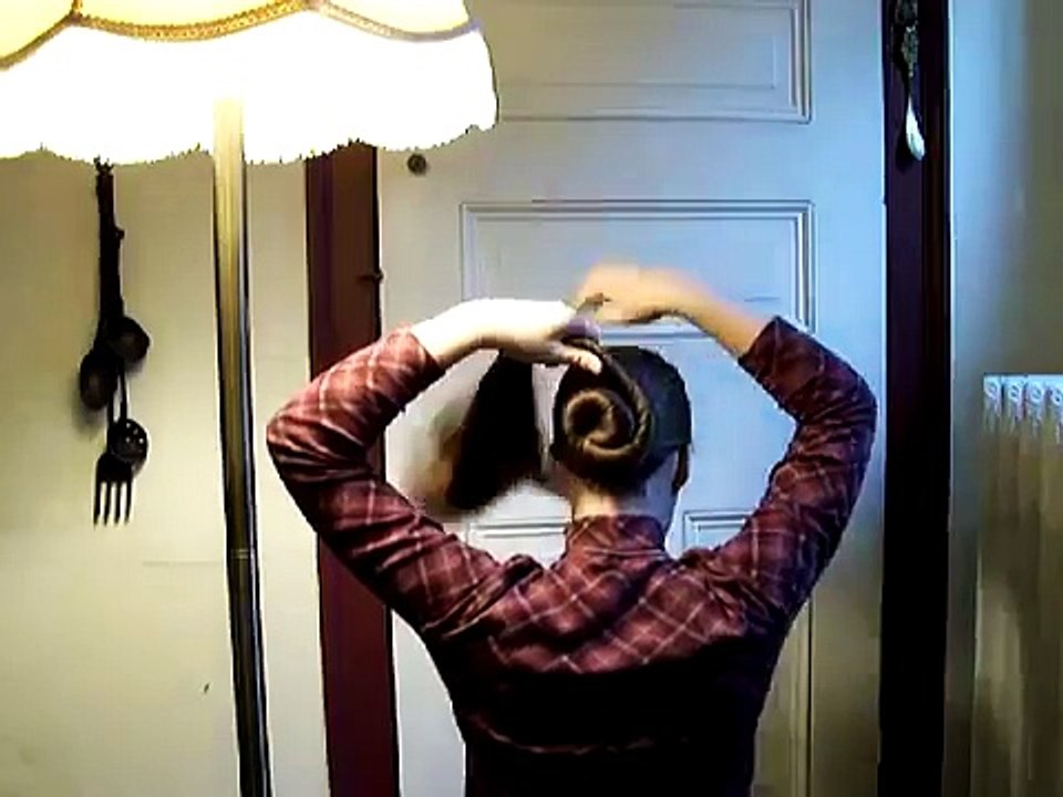 Cinnamon (basic) bun on long hair.