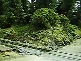 Modellbahn: ÖBB 52.7070 mit Milchfass-Transportwagons (2, Bahnübergang)