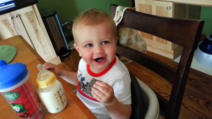 Toddler mimics father's cynical laugh