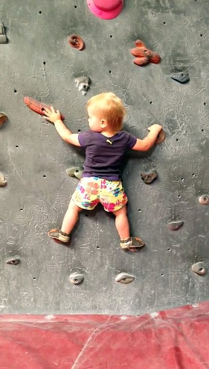 Baby climbing indoors