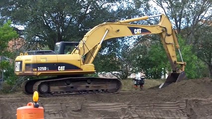 Cattleman Road Cat 325D Backhoe and 725 Dump Truck