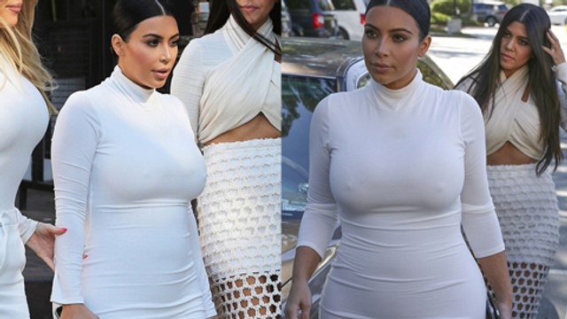 Kim Kardashian Shows Off BABY BUMP In Skintight White Dress