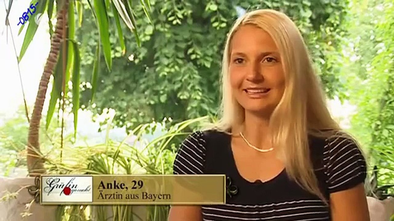 Presenter  wearing a purple satin blouse for a new Dating game in Germany