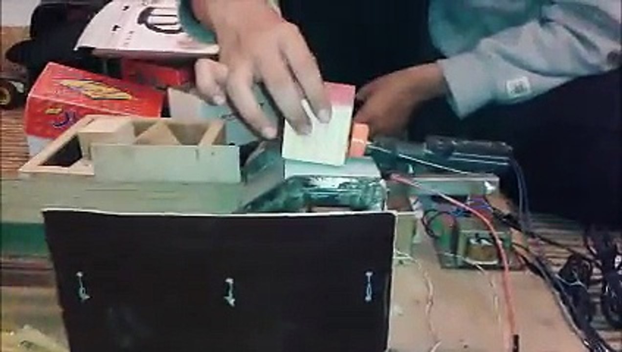 Weight Detector With Sorter Using Robotic Arm