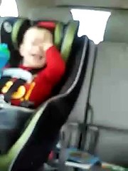 Baby dancing in the car