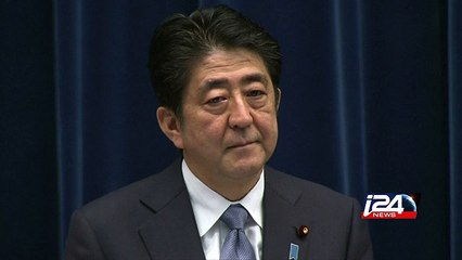 Japan PM expresses WWII remorse, but says next generation need not apologize
