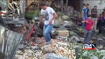 Truck bomb kills dozens in Baghdad market