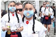 Katy Perry wears cute school girl outfit and face mask as she embraces Japanese culture on tour
