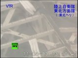 Detailed close-up aerial video of wrecked reactors at Fukushima