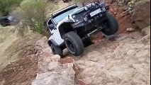 SUV Almost Flips Over Backward While Climbing Rocks