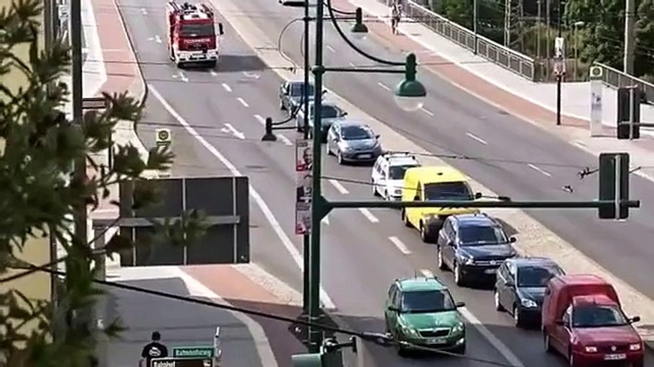 So dumb car driver doesn't want to let the firefighter truck go!
