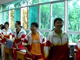 Students sing the Chinese National Anthem