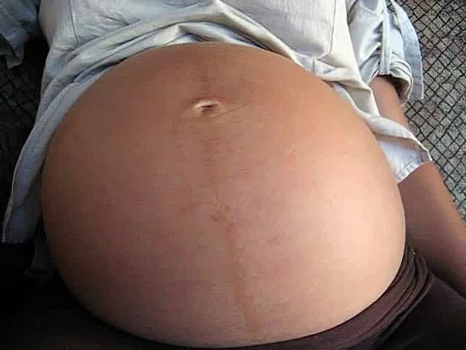 Baby girl moving inside her mother