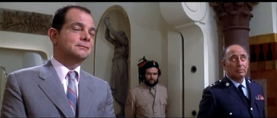 Inspector Clouseau examines the crime scene