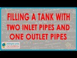 Filling a tank with two inlet pipes and one outlet pipes