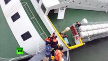 Sewol ferry captain flees as ship sinks with hundreds trapped inside