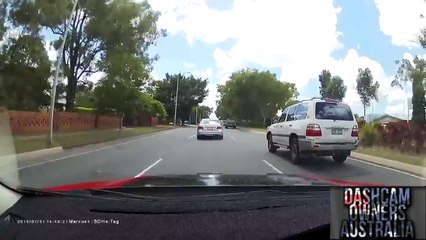 Truck runs red light and causes crash. - Brisbane
