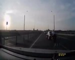 Motorcyclist crash and perfectly lands on a car's roof