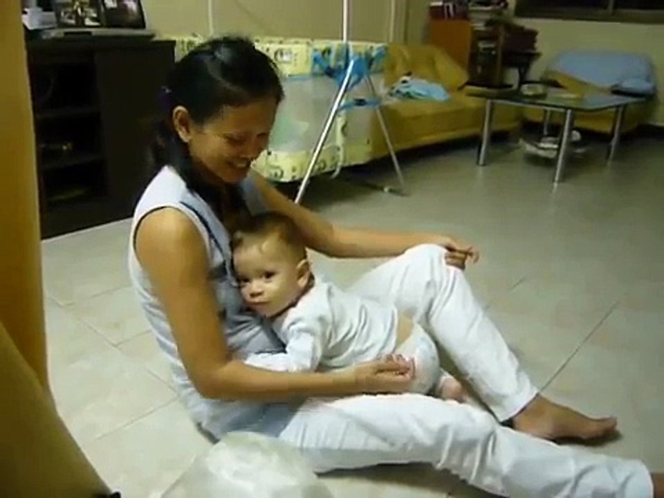 08JULY09 breastfeeding ten months old boy addicted