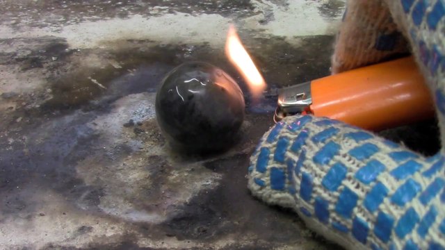 Liquid nitrogen cooled nickel ball placed in gasoline