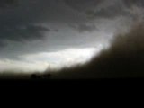 Dust getting sucked up into supercell Texas 2003