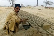 A Christian Man Making Bricks at Brick Factory