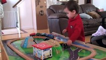 Time lapse of toddler assembling toy train...