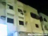 Man throws wife from building
