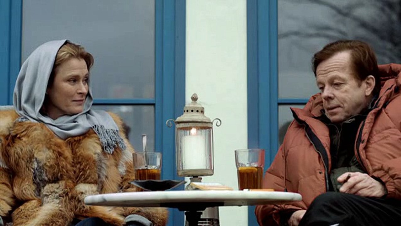 Lena Endre in red fox