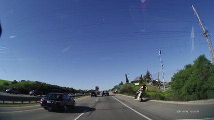 Police officer assists motorist in epic fashion