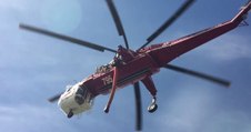 Helicopter Crews Pick Up Water to Quench Californian Lake Fire