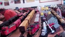 Chasing Trains Around Dan Larson's Garage O-Gauge Toy Train Layout.