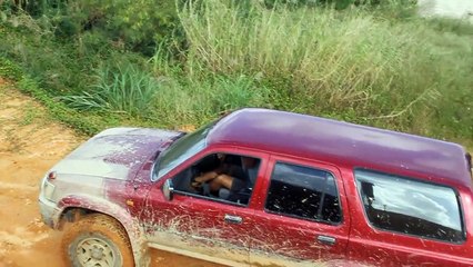 Toyota Surf climbing some mounds in Onna Point, Okinawa, Japan.