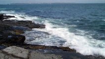 Ocean Waves lapping against the rocks