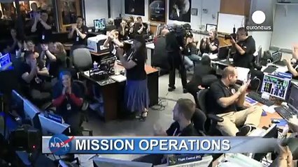 NASA probe "phones home" after surviving flyby with Pluto