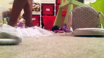 Funny baby cries after falling her balance