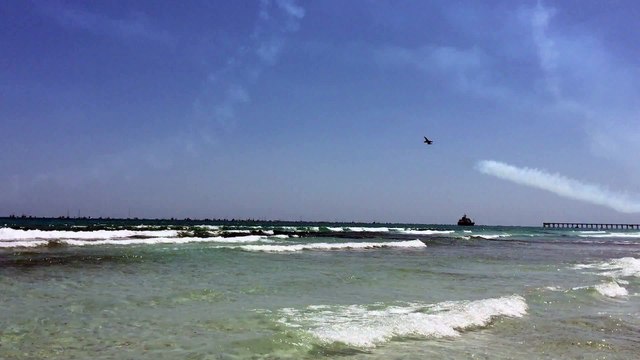 Most American Fly Over Ever: Blue Angel Buzzes So Close To Florida Beach It Sends Umbrellas Flying Everywhere