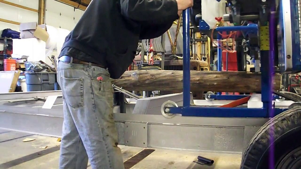 Homemade Portable Sawmill Cutting it's first boards