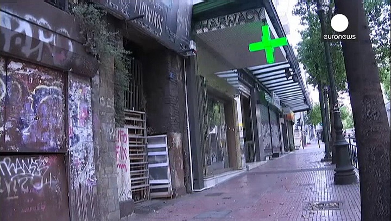 Workers walk out in Greece in protest over austerity measures before parliament