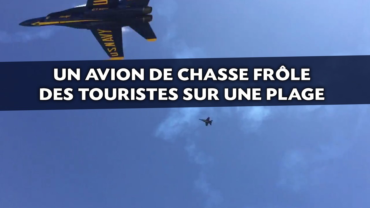 Un avion de chasse frôle des touristes sur une plage