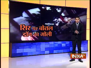 OMG_ Mafia Aims At Bottle Kept Over Businessman's Head (watch video) _ India Tv