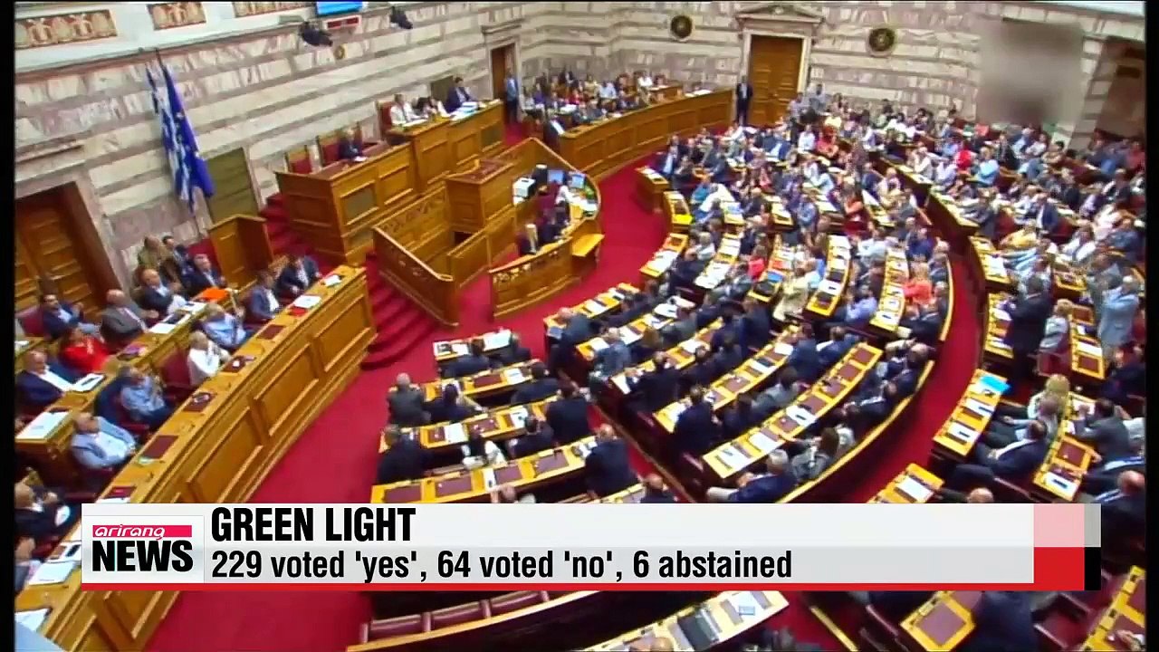 Greek parliament approves harsh austerity bill needed to secure bailout